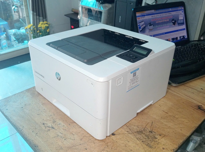 may in hp 404dn  cũ
